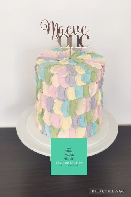 Just a pastel cake with a stunning topper!